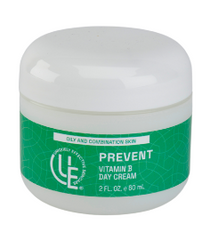 2 oz. Jar of Prevent Vitamin B Day Cream for oily and combination skin, shown on a clean white background with green label. Lightweight moisturizer that reduces shine and hydrates without heaviness.