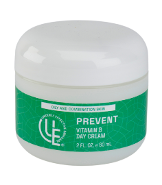 2 oz. Jar of Prevent Vitamin B Day Cream for oily and combination skin, shown on a clean white background with green label. Lightweight moisturizer that reduces shine and hydrates without heaviness.