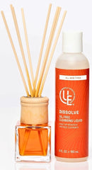 Uniquely Effective Skincare's 6 fl. oz. bottle of Dissolve Oil-Free Cleansing Liquid for Makeup Remover for all skin types with fragrance diffuser