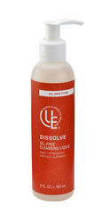 6 oz. clear bottle of Uniquely Effective Skincare’s Dissolve Oil-Free Cleansing Liquid  highlighting its gentle, non-greasy formula designed to remove makeup and cleanse sensitive skin, including those with eyelash extensions.