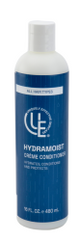 16 ounce bottle of HydraMoist Crème Calm & Coil Conditioner by Uniquely Effective Skincare – a vitamin- and sea mineral-infused hair treatment in a sleek, minimalist bottle. Designed to hydrate, detangle, and restore shine to textured, dry, or frizzy hair. Suitable for color-treated hair."