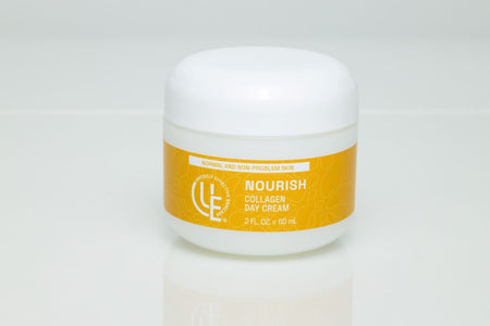2 oz. jar of Uniquely Effective Skincare's Nourish Collagen Day Cream