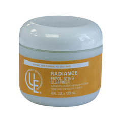 4 ounce jar of Uniquely Effective Skincare's Radiance Exfoliating Cleanser with yellow label on a white background for Normal and Normal-to-oily skin