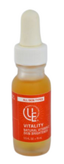 1/2 fl. oz. glass bottle of Uniquely Effective Skincare's Vitality Natural Vitamin C Skin Brightener Serum for all skin types