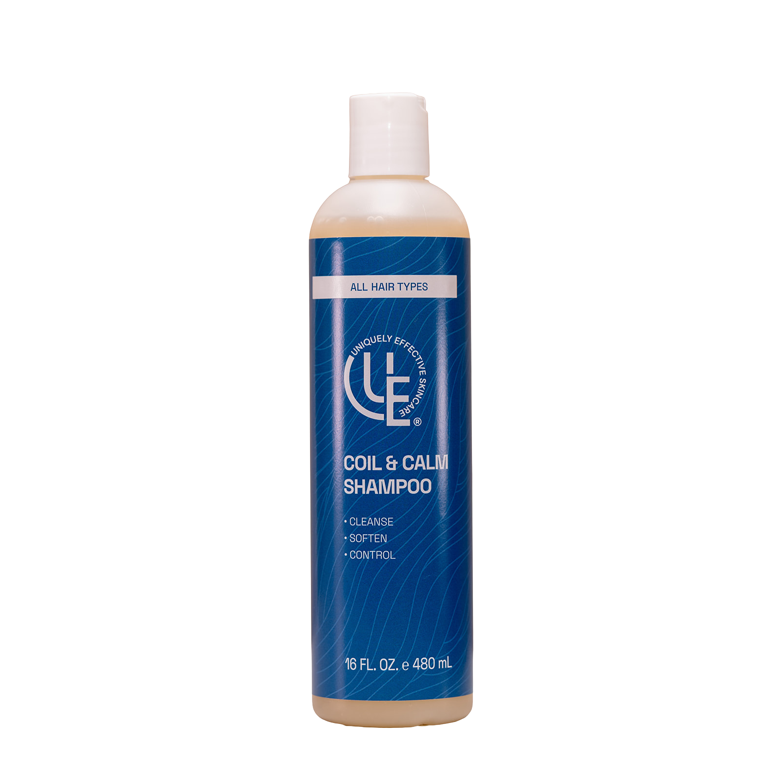 Coil & Calm Moisturizing Crème Shampoo shown in a sleek 16 oz. bottle. The creamy, botanical-rich formula is being applied to textured 4C hair, highlighting its ability to deeply hydrate, soften, and balance the scalp. The shampoo creates a gentle lather while working through coily strands, helping to detangle and promote a smoother, healthier-looking finish.