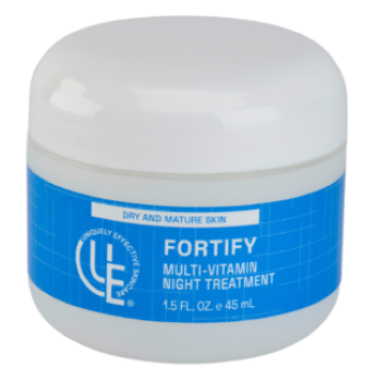 A 2 oz jar of Uniquely Effective Skincare’s Fortify Multi-Vitamin Night Cream  with a smooth, rich cream featuring vitamin-rich ingredients like avocado, carrot, and sea buckthorn, symbolizing its deep hydration and overnight renewal benefits for dry and mature skin.